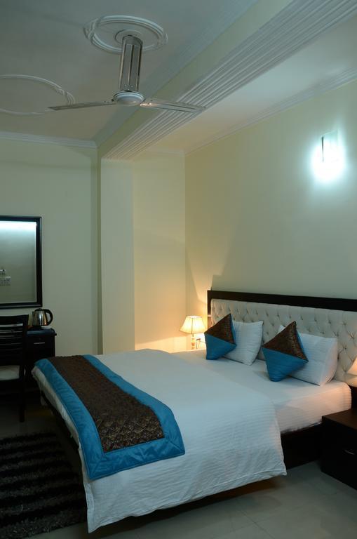 Hotel Global Radiance Neu-Delhi Zimmer foto